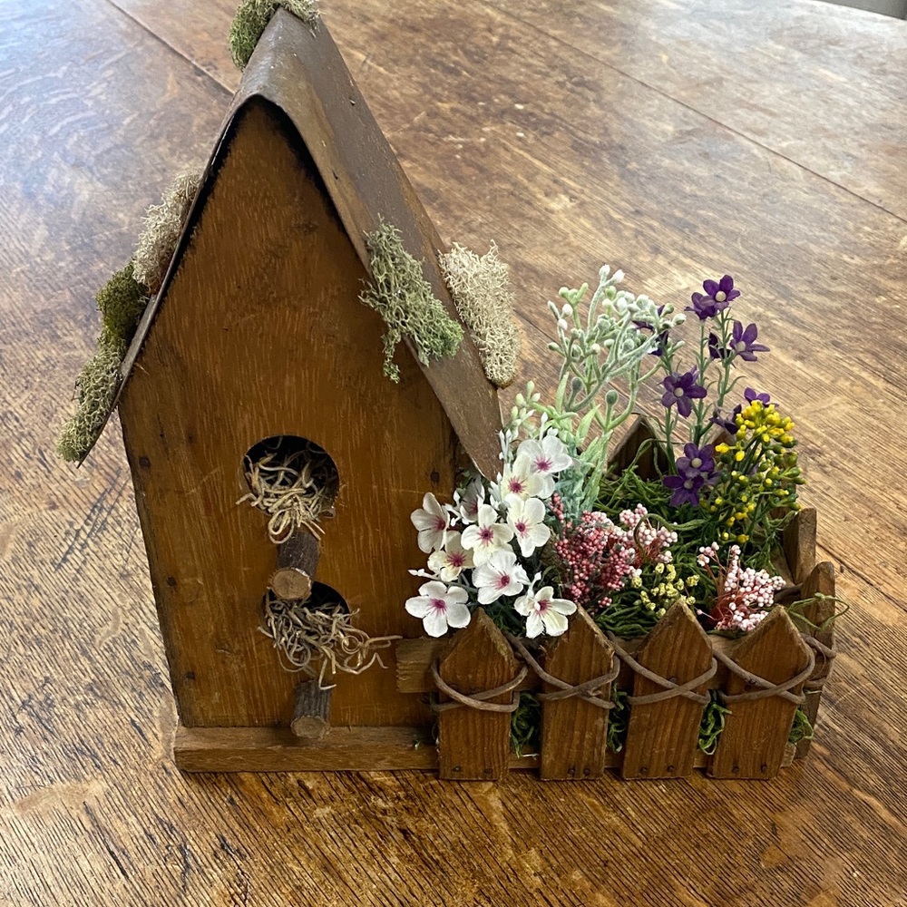 Rustic Wooden Birdhouse with Floral Accents